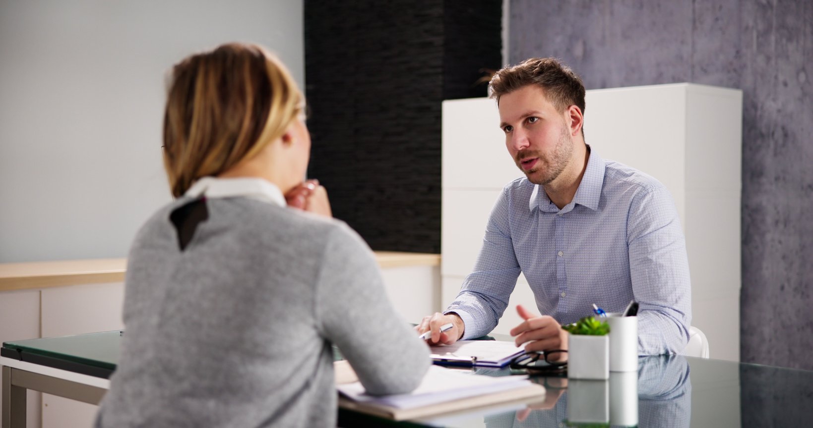 Two People Interview Meeting In Office